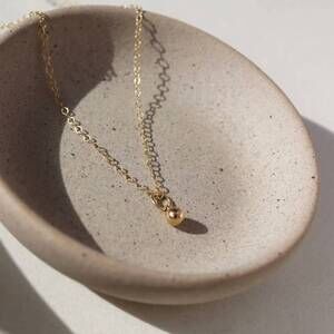 NEW TOKEN JEWELRY golden globe necklace in gold